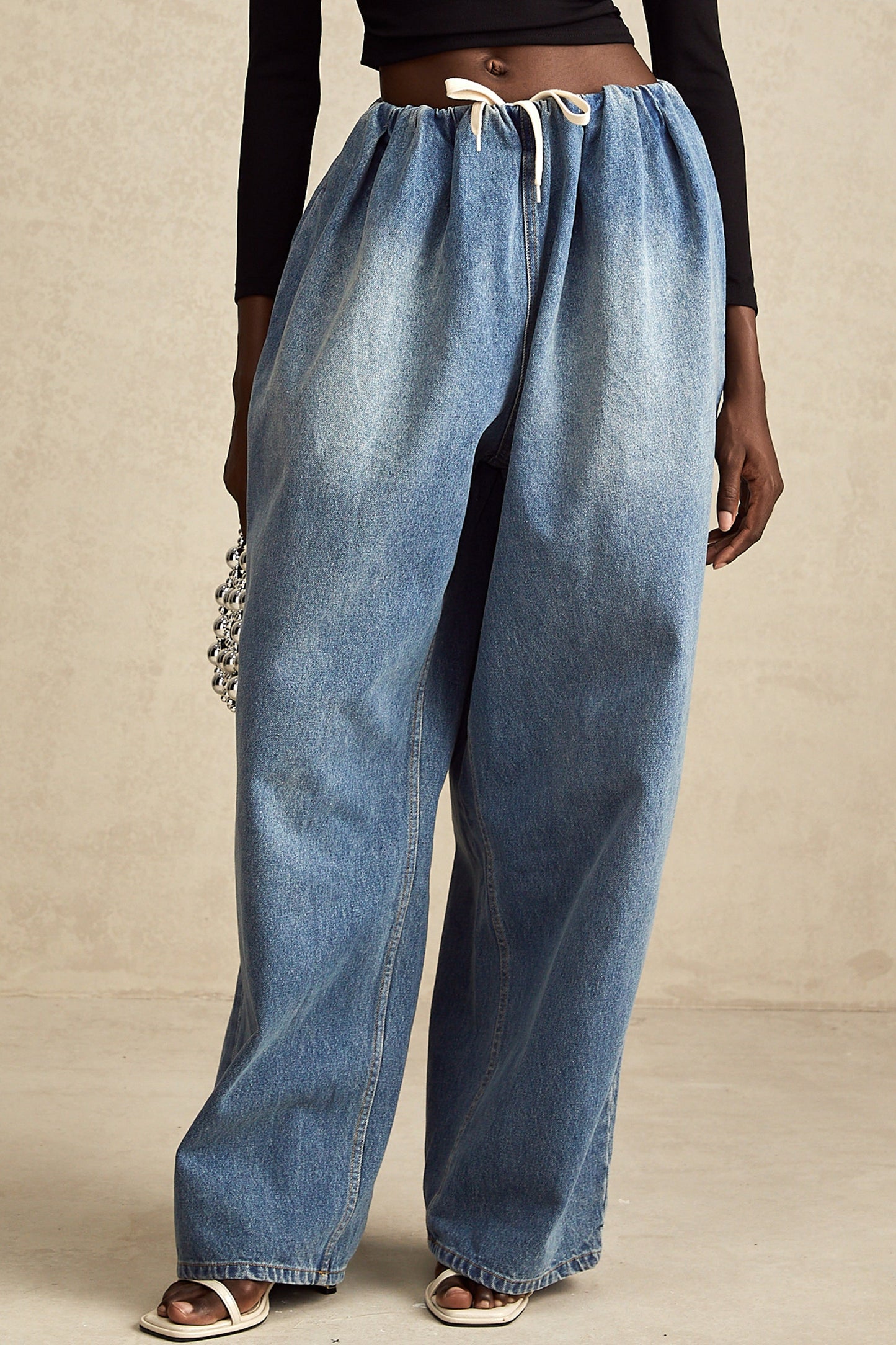 Eulalie blue pleated low-rise denim trousers