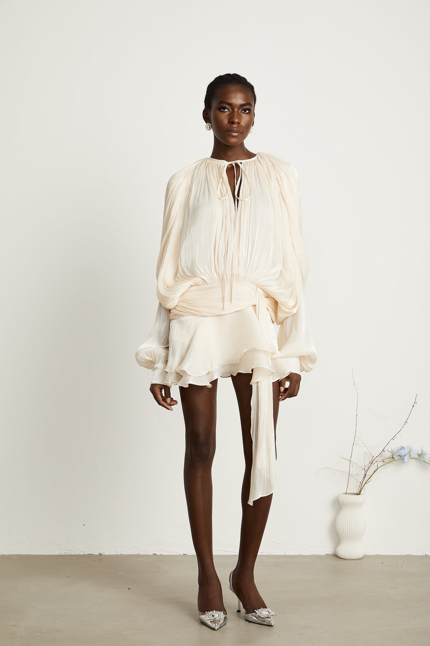 Eugénie fully-pleated ruffled mini dress in Neutrals