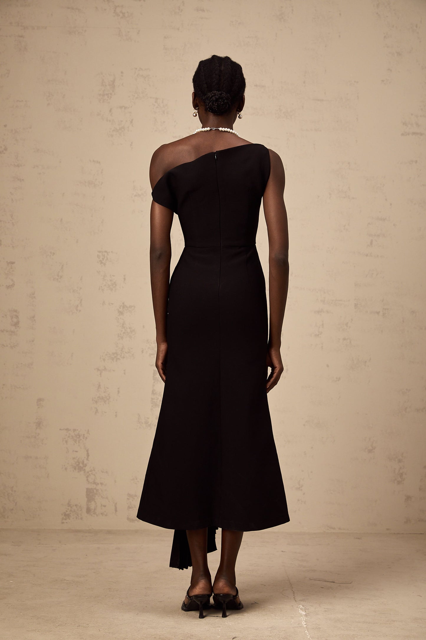 Laurine asymmetric draped midi dress in Black