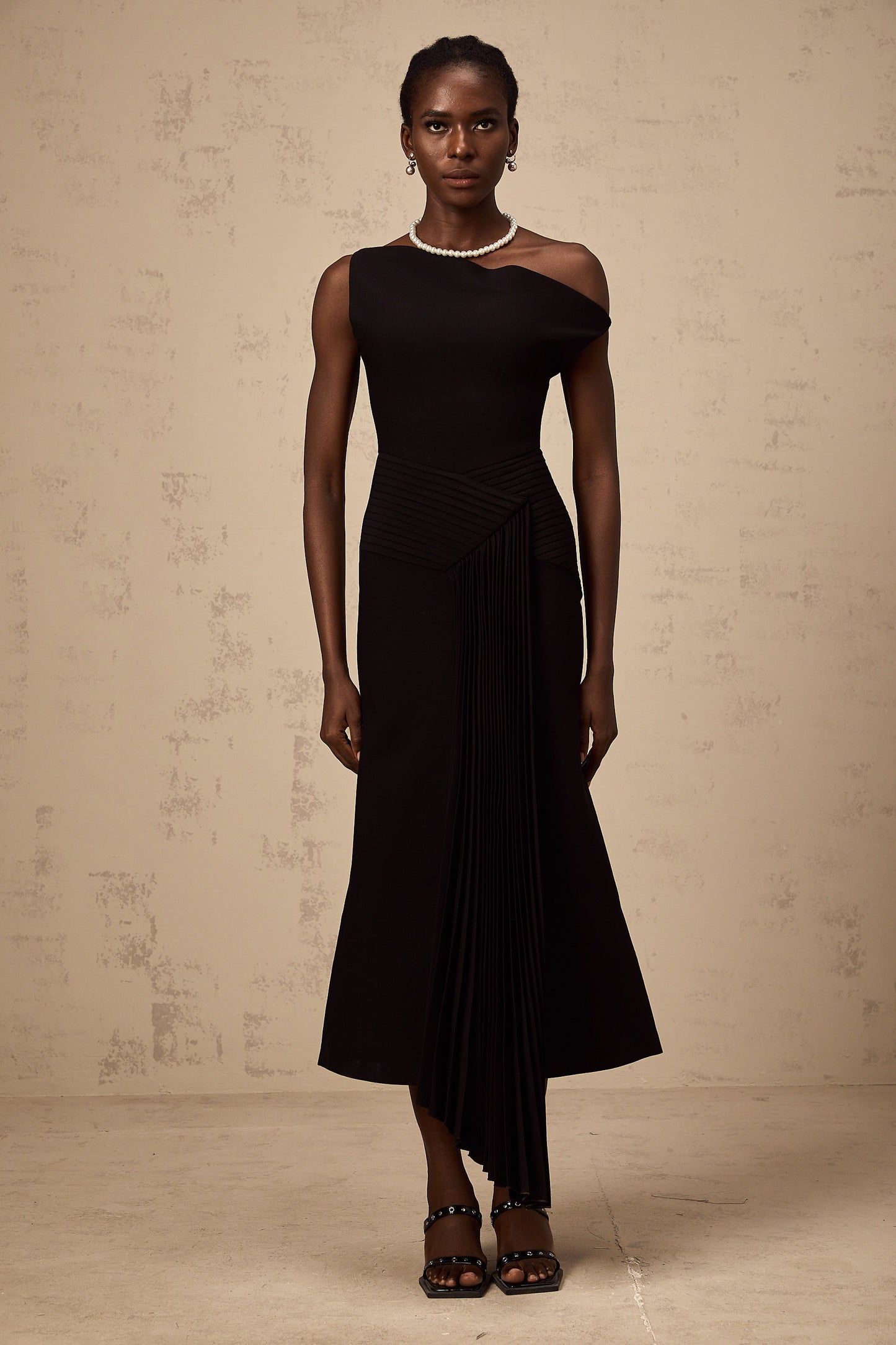 Laurine asymmetric draped midi dress in Black