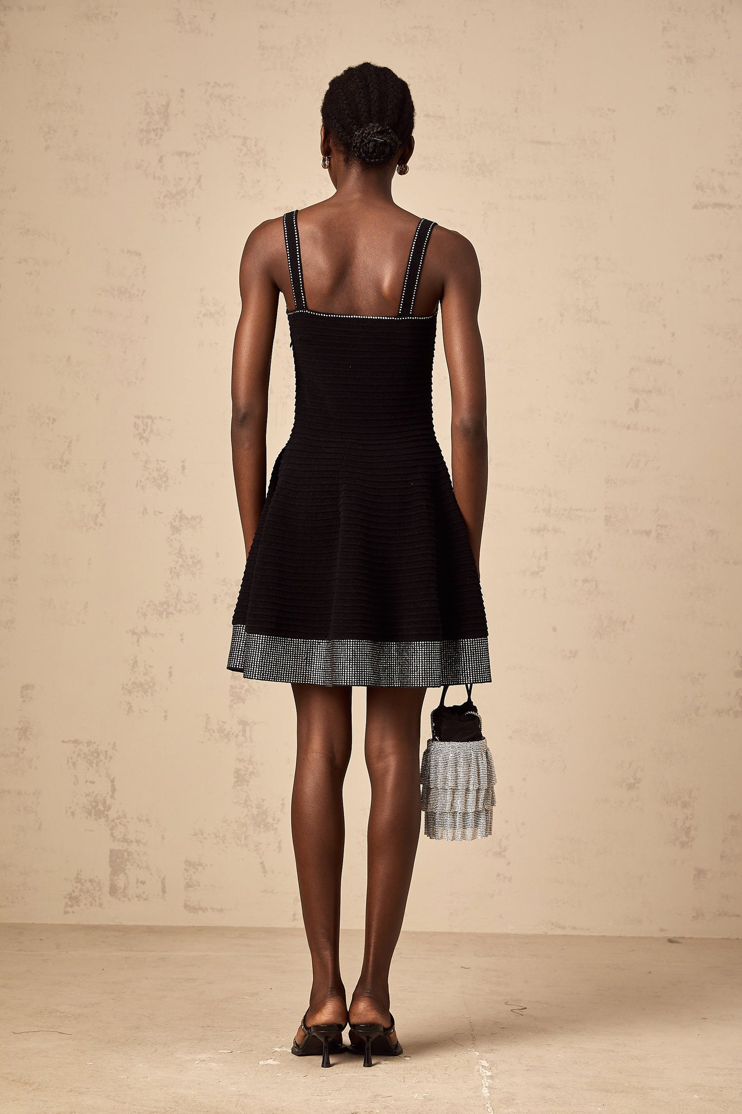 Éliane black studded flared knit mini dress