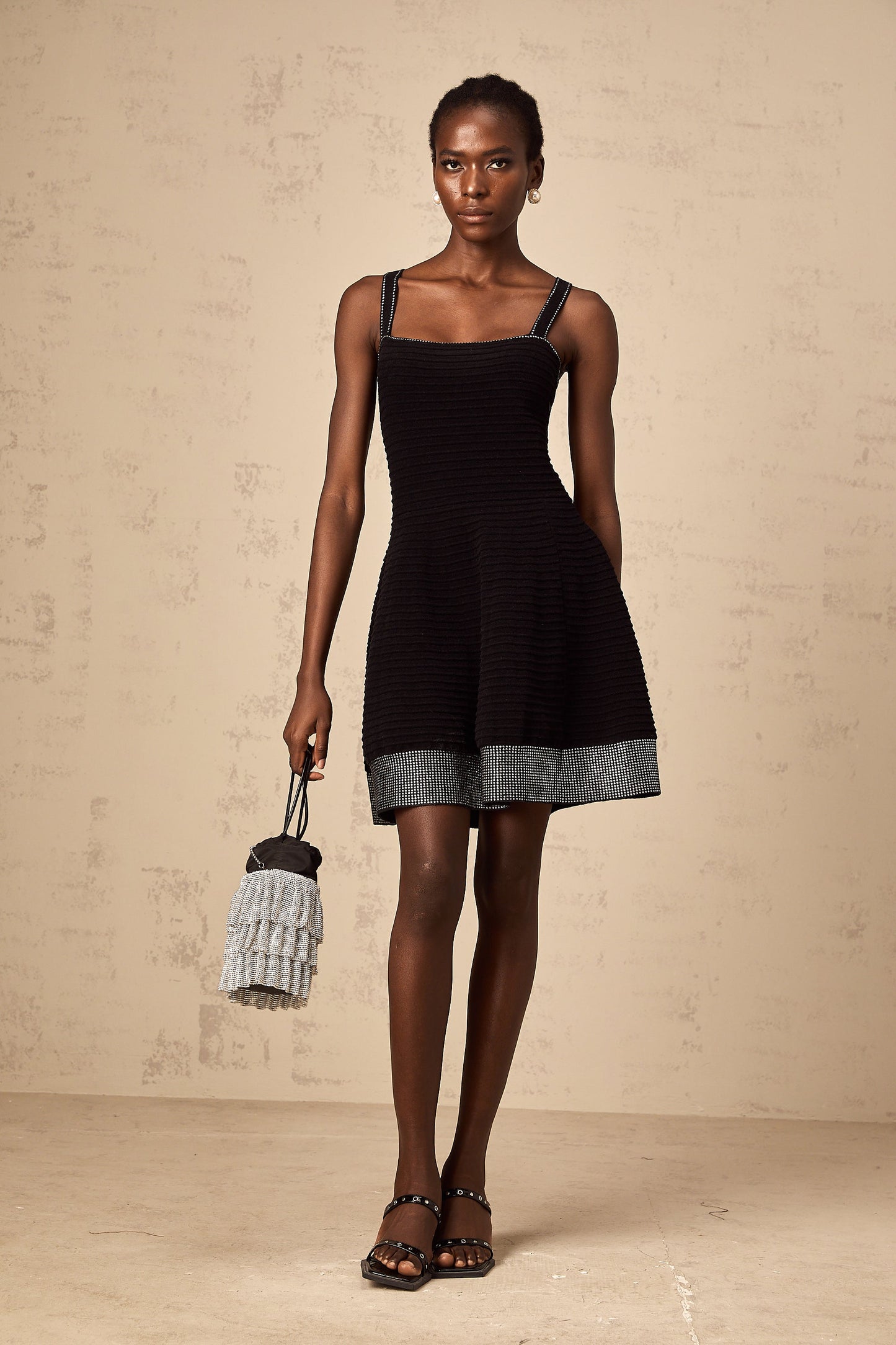Éliane black studded flared knit mini dress