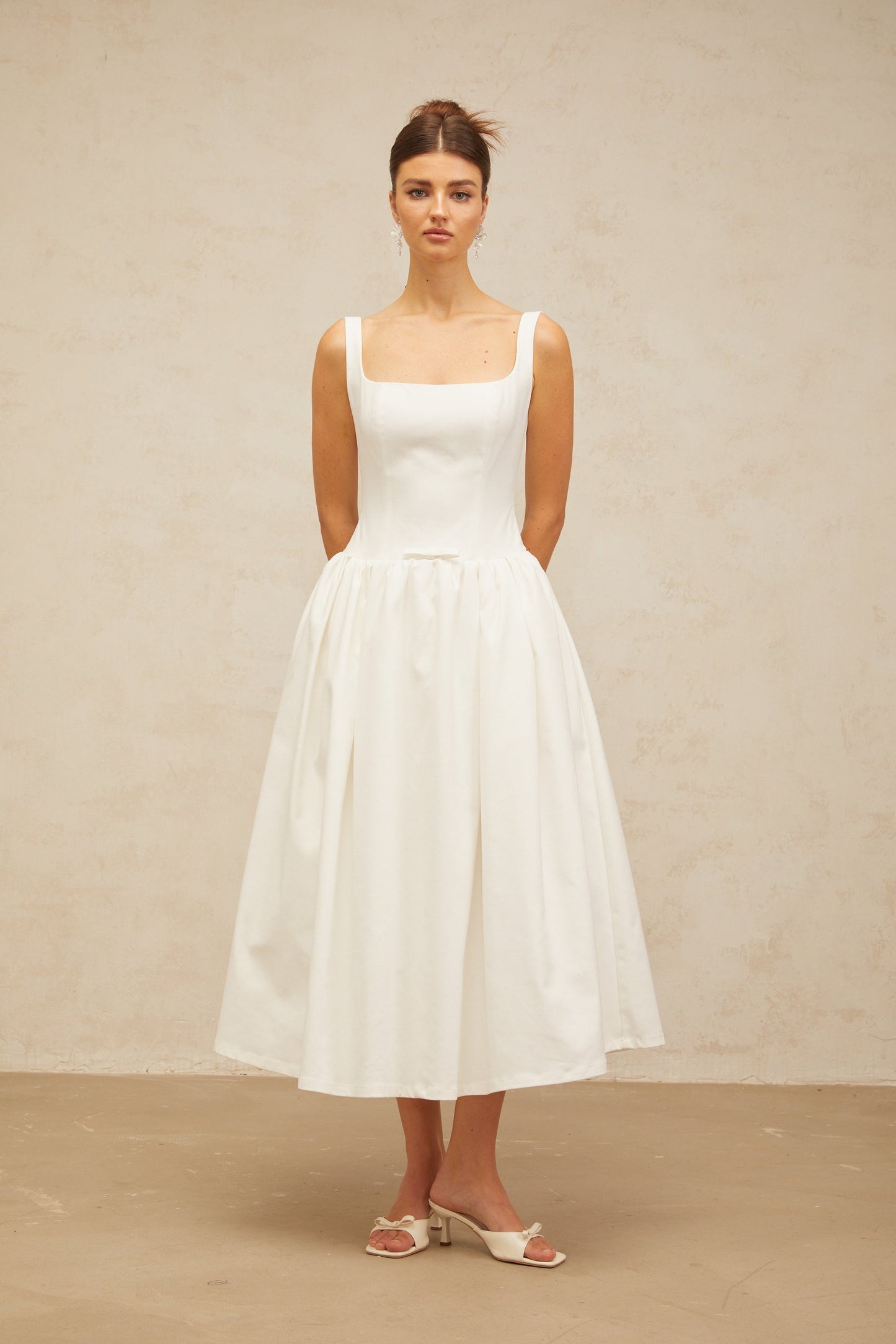 Perrine white bowknot flounce midi dress