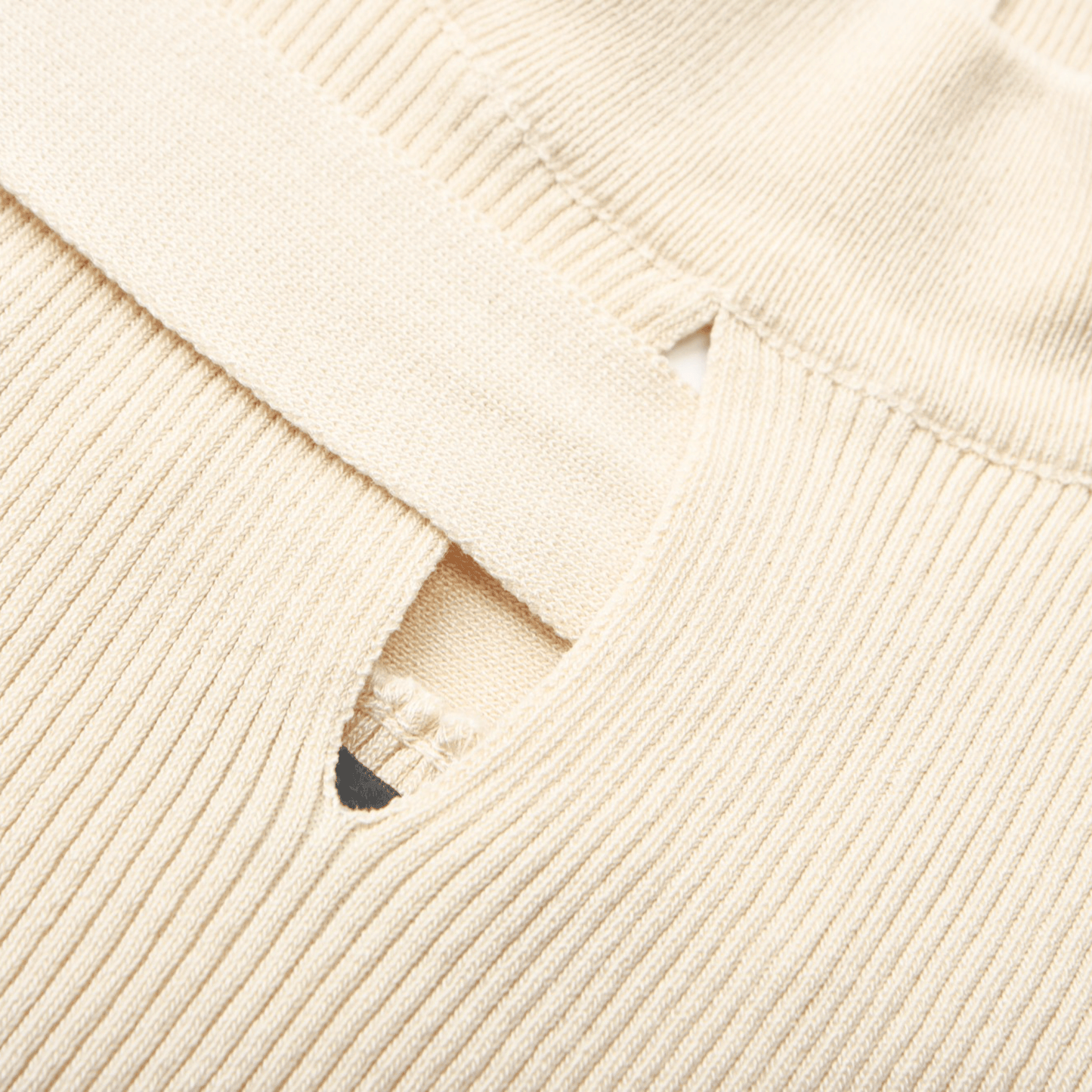 Aladdin-rollneck cut-out knitted top