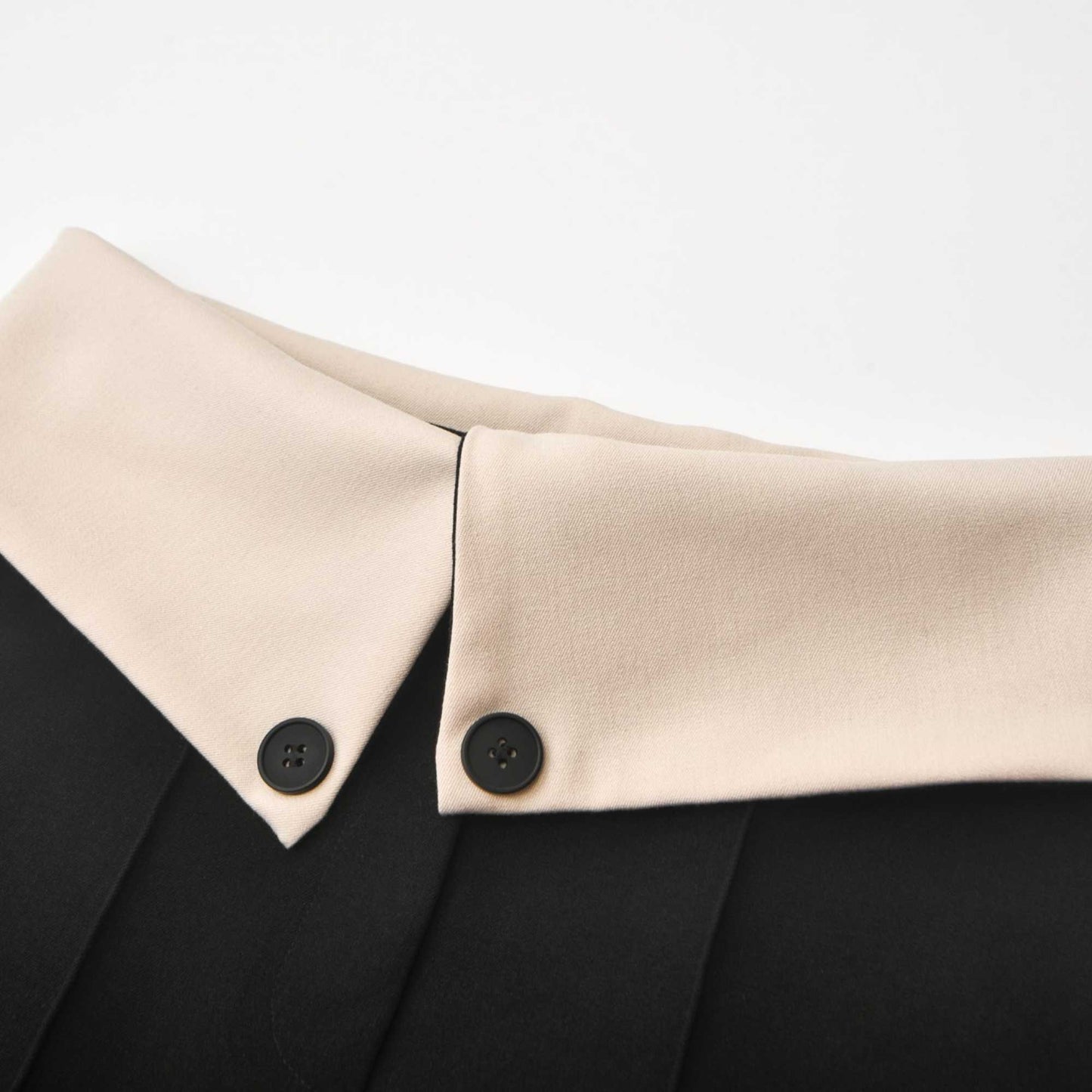 Naomi inside-out contrast-color trousers