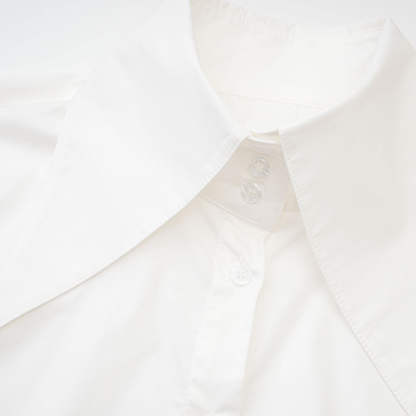 Solène white pointed-collar shirt