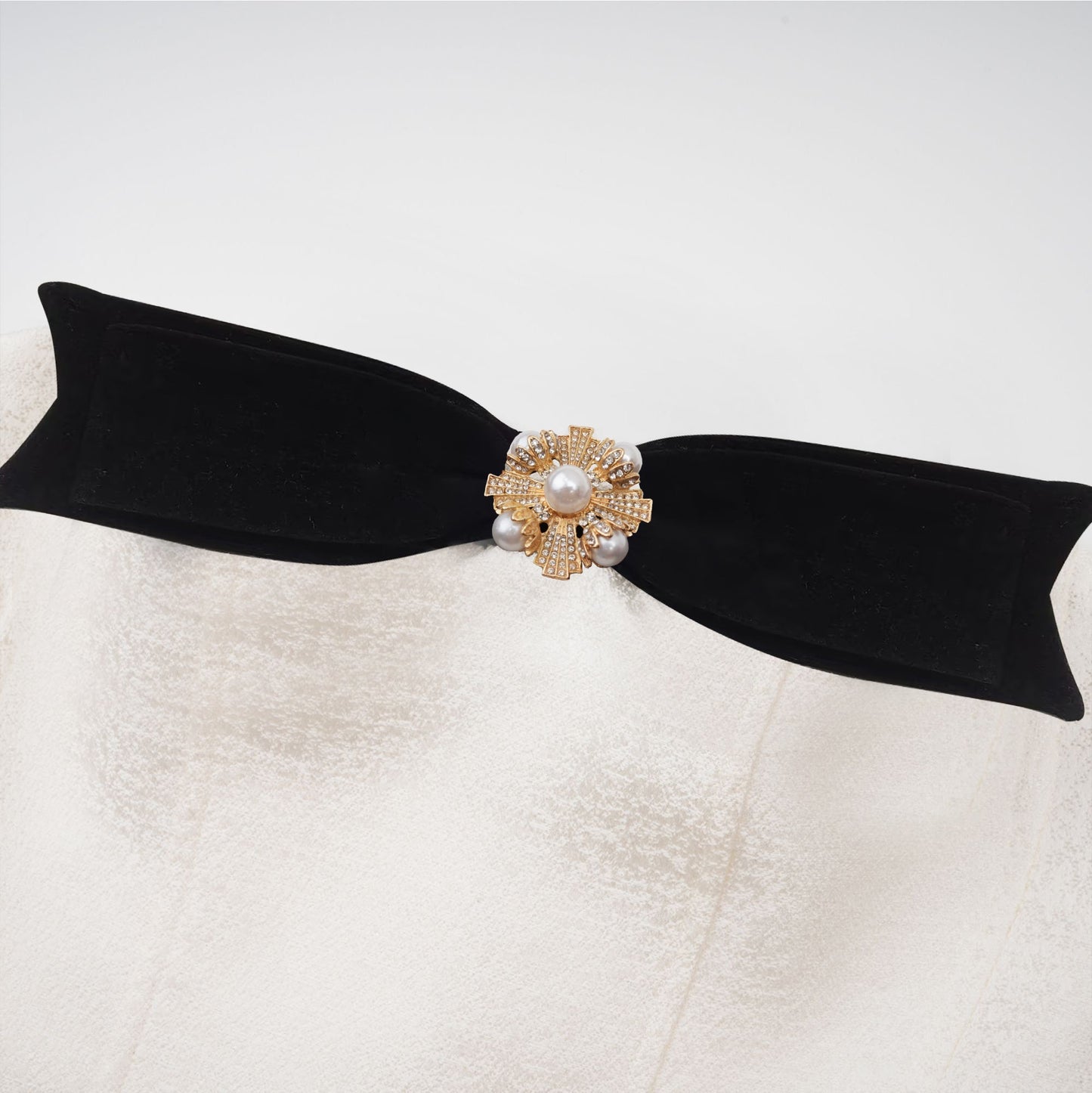 Araminta bow-detail off-shoulder mini dress