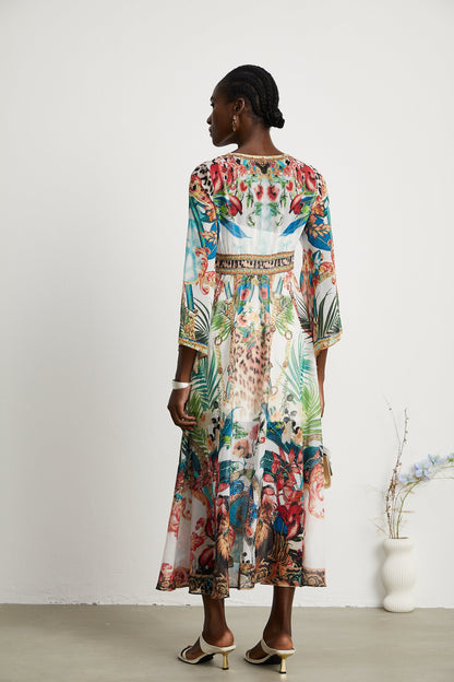 Éva pattern-print V-neck midi dress