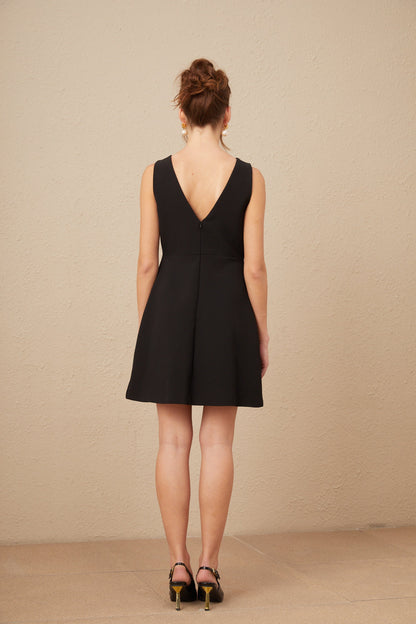 Roxane V-neck sequin-bow mini dress in Black (US Only)