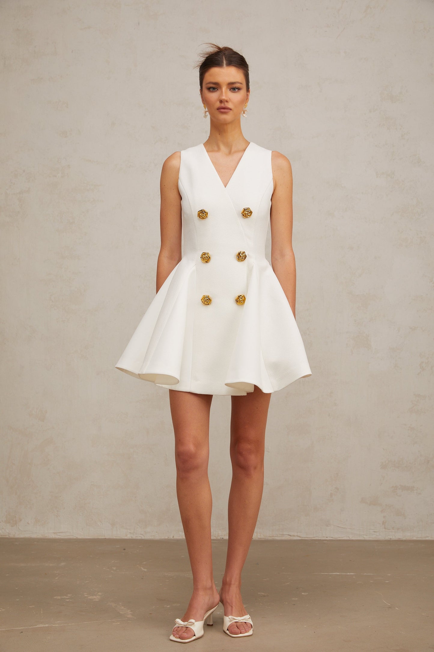 Élise pleated peplum-hem sleeveless mini dress